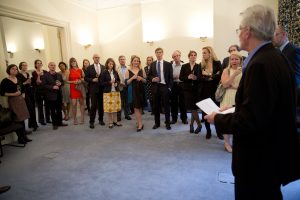 John Stephens, director of the Center for European Studies, addresses the group in London. (Photo by David Levenson)