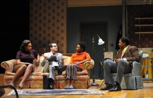 L to R: DEE DEE BATTEAST as Ruth Younger, MATT GARNER as Karl Lindner, MIRIAM HYMAN as Beneatha Younger, and MIKAAL SULAIMAN as Walter Lee Younger in PlayMakers Repertory Company’s production of “A Raisin in the Sun” by Lorraine Hansberry.  (photo by Jon Gardiner)