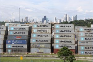 Stacks of Maersk containers await loading onto ships at the Balboa Terminal, with the skyline of Panama City in the background. (Photo: Rachel Willis)