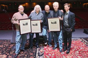 From left, Stephen Stills, David Crosby, Ken Weiss, Graham Nash and Mark Katz at Crosby Stills & Nash's spring show at the Durham Performing Arts Center. (photo by Beth Lawrence)