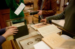 UNC students and Wilson Library staff members prepare materials for the student-curated exhibition "Imagining the U.S. Civil War, 1861-1900." (photo courtesy of UNC Library by Kelly Creedon)