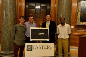 Event Horizon editors Fedor Kossakovski, left, John Cruickshank, second from left and Raymond Blackwell, far right, pose with Faster LLC general manager Gunnar Wieboldt at their launch event. Photo by Jacob Rosenberg.