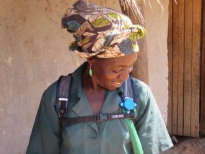 A woman wearing personal exposure monitoring equipment that monitored her exposure to cookstove smoke in Kasumgu, Malawi.