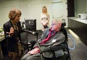 Chancellor Carol L. Folt talks with renowned physicist Stephen Hawking. (photo by Ulf Sirborn)