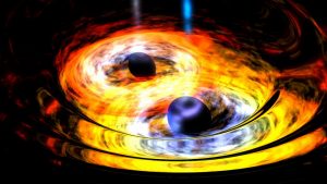 Artist rendering of two black holes merging. (photo courtesy of NASA)