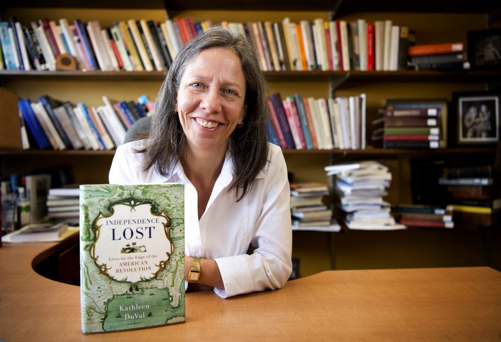 Kathleen DuVal with her new book, Independence Lost, a finalist for the George Washington Book Prize. (photo by Jon Gardiner)