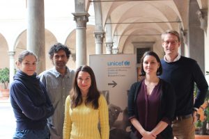 Public policy professor Ashu Handa (second from left) with UNICEF researchers based in Italy. (photo by Michelle Mills)