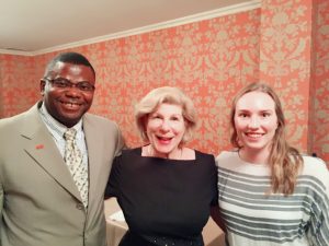 From left, associate professor of political science Isaac Unah, an expert on the Supreme Court, with Nina Totenberg and Student Erin Babilon, who is majoring in political science, and peace, war and defense.