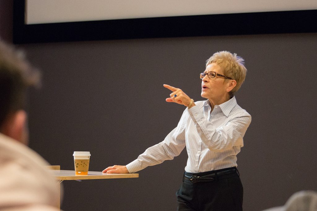 Entrepreneur-in-residence Jan Davis addresses students in the class Econ 325: “Principles + Practice,” which focuses on core entrepreneurial skills including the art of innovation, creative design, customer development and team dynamics. (photo by Kristen Chavez)