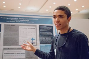 Luke Fernandez presents his research at the spring 2017 Celebration of Undergraduate Research. (photo by Kristen Chavez)