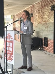 Gaddis speaks at a recent alumni event at Rocky Mount Mills. (photo by Mark Newman)
