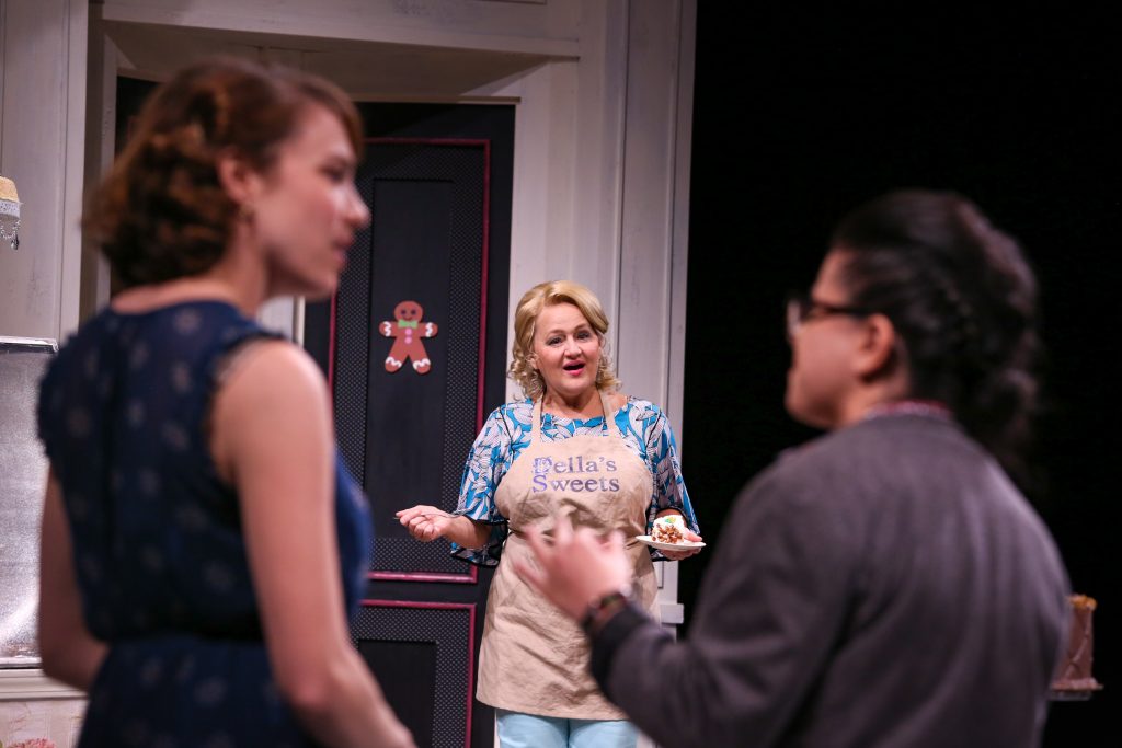 Jenny Latimer as Jen, Julia Gibson as Della, and Christine Mirazayan as Macy in PlayMakers Repertory Company’s production of “The Cake” by Bekah Brunstetter.